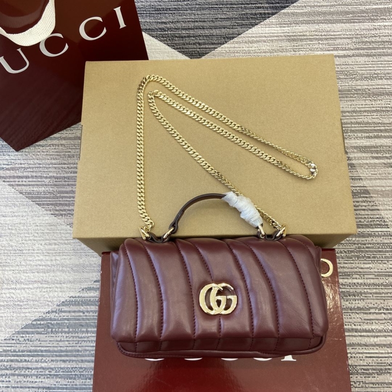 G*u*i top handle bags